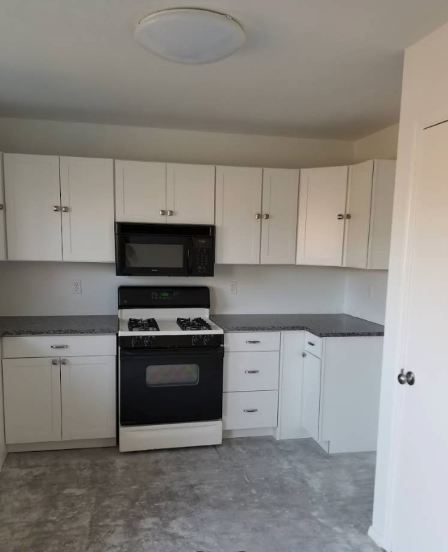 Kitchen Remodel - White Cabinets with Modern Appliances