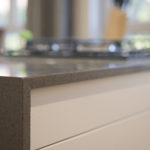Seam applicable to put together countertops and cabinet side walls: an example from Austin, TX home.